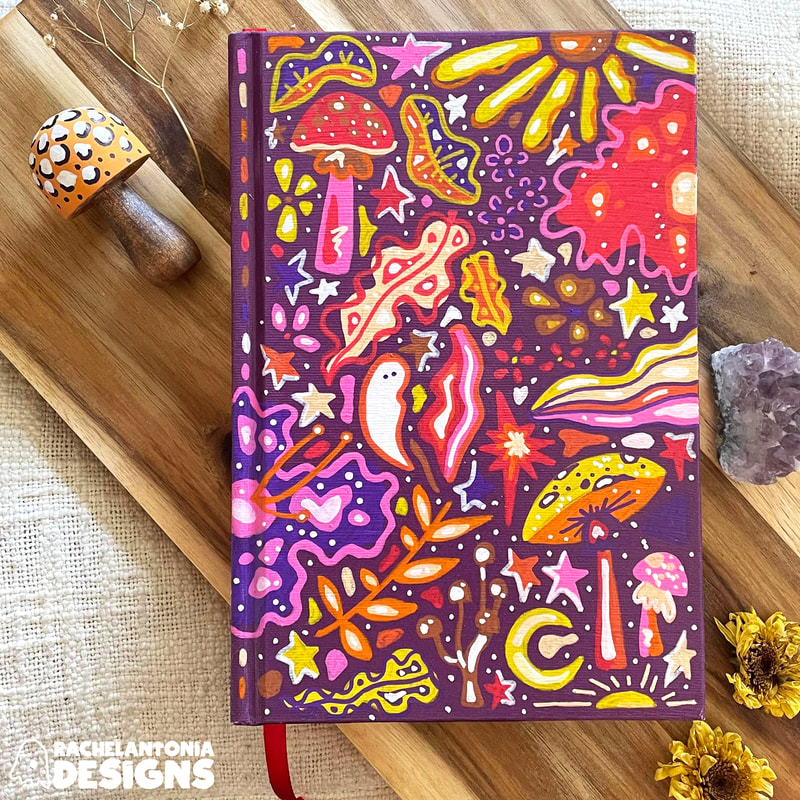 Hand painted hardcover journal with mushrooms, ghosts, plants. and moons